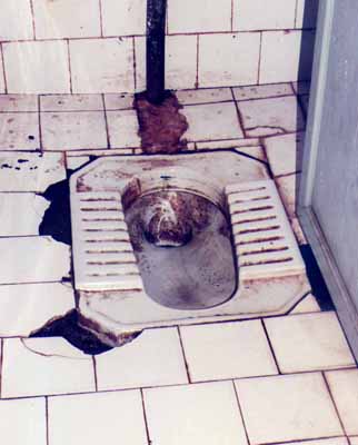 View of a filthy toilet at the State government-owned Kalinga Stadium in Bhubaneswar on December 21, 2008.